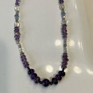 Dark and light purple semi-precious stones with light blue crystals necklace.